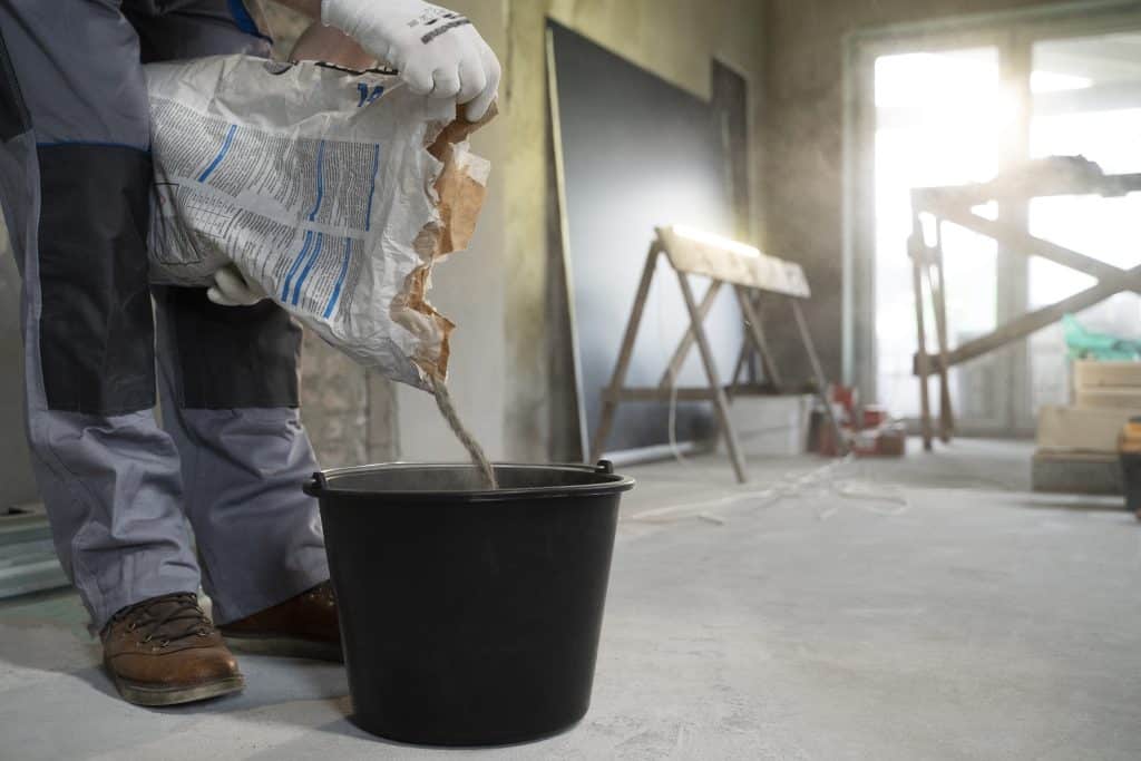 tiler working renovation apartment